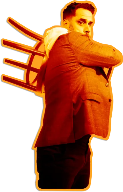 Louis Grenier carrying a chair, ready to talk positioning